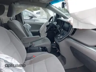 2015 Toyota Sienna LE AAS with VIN 5TDKK3DC1FS551231, listed as a IAAI auction lot 41991035 with 115,149 mi miles and . Bid and sale history available at DreamBid. Image 5.