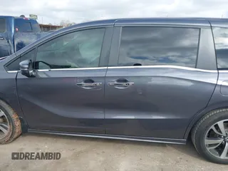 2022 Honda Odyssey Touring with VIN 5FNRL6H80NB023623, listed as a IAAI auction lot 41512586 with 63,329 mi miles and . Bid and sale history available at DreamBid. Image 15.