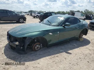 2011 BMW Z4 sDrive30i with VIN WBALM5C55BE495921, listed as a Copart auction lot 71453304 with 116,136 mi miles and Salvage Title. Bid and sale history available at carsss.com. Image 1.