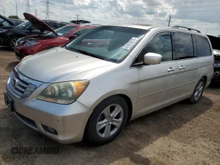 2008 Honda Odyssey Touring with VIN 5FNRL389X8B054910, listed as a Copart auction lot 61876215 with 206,289 mi miles and Salvage title. Bid and sale history available at DreamBid. Image 1.
