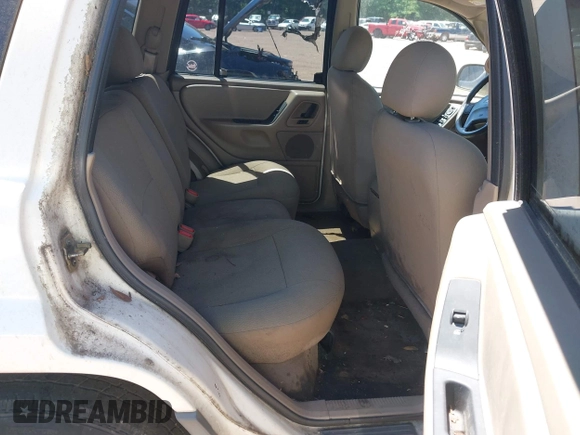 2002 Jeep Grand Cherokee Laredo with VIN 1J4GX48S32C134911, listed as a IAAI auction lot 42323138 with 156,852 mi miles and . Bid and sale history available at DreamBid. Image 8.