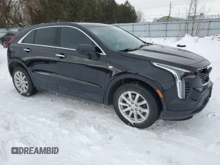 2022 Cadillac XT4 FWD Luxury z VIN 1GYAZAR48NF163967, wystawiony jako Copart lot #43148925 z przebiegiem 58 788 mil mil oraz Czysty tytuł • Clean title. Historia ofert i sprzedaży dostępna na DreamBid. Obrazek 4.