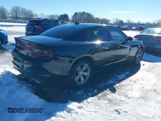 2015 Dodge Charger SXT with VIN 2C3CDXHG5FH841090, listed as a IAAI auction lot 41293591 with 107,732 mi miles and . Bid and sale history available at DreamBid. Image 4.