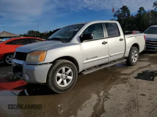 2011 Nissan Titan SV with VIN 1N6BA0ED7BN304060, listed as a Copart auction lot 89028595 with 139,268 mi miles and Salvage Title. Bid and sale history available at DreamBid. Image 1.