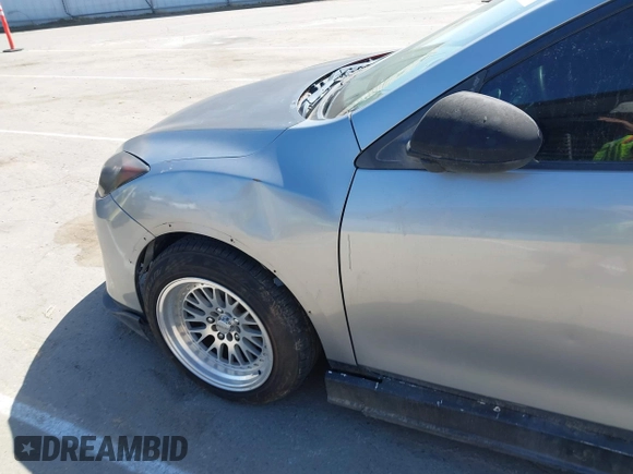 2013 Mazda 3 i SV with VIN JM1BL1TG9D1765030, listed as a IAAI auction lot 42110584 with 143,723 mi miles. Bid and sale history available at carsss.com. Image 16.