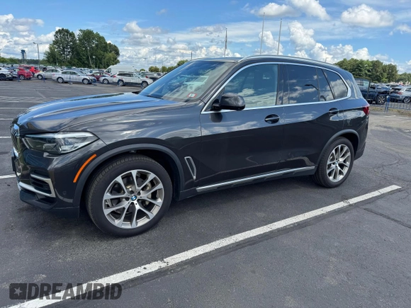 2022 BMW X5 xDrive40i с VIN 5UXCR6C09N9K62098, выставлен на аукционе Copart как лот 64471545 с пробегом 70 161 миль миль и Чистый • Clean title. История ставок и продаж доступна на DreamBid. Изображение 1.