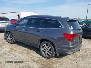 2017 Honda Pilot Touring with VIN 5FNYF5H9XHB046479, listed as a IAAI auction lot 41941449 with 162,554 mi miles. Bid and sale history available at carsss.com. Image 3.