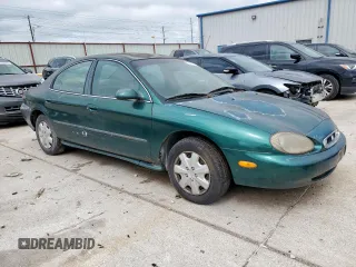 1999 Mercury Sable GS with VIN 1MEFM50U1XA644365, listed as a Copart auction lot 55881515 with 155,204 mi miles and Clean Title. Bid and sale history available at DreamBid. Image 4.