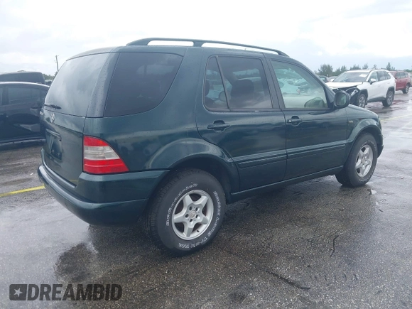 2000 Mercedes-Benz M 320/430/500 with VIN 4JGAB54E0YA218894, listed as a IAAI auction lot 41985116 with 120,889 mi miles and . Bid and sale history available at DreamBid. Image 4.
