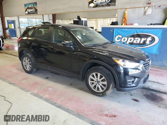 2016 Mazda CX-5 Sport with VIN JM3KE4BY1G0870166, listed as a Copart auction lot 60433035 with 93,433 mi miles and Salvage title. Bid and sale history available at DreamBid. Image 4.