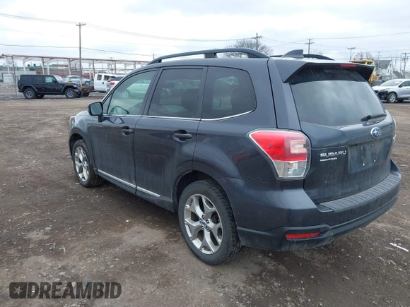 2017 Subaru Forester Touring with VIN JF2SJATC5HH518783, listed as a IAAI auction lot 41889172 with 115,801 mi miles and . Bid and sale history available at DreamBid. Image 3.