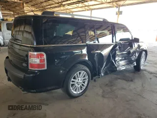 2016 Ford Flex SEL z VIN 2FMGK5C87GBA21195, wystawiony jako Copart lot #52667655 z przebiegiem 129 100 mil mil oraz Szkoda całkowita • Salvage title. Historia ofert i sprzedaży dostępna na DreamBid. Obrazek 3.