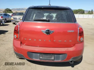 2014 MINI Countryman with VIN WMWZB3C5XEWR42035, listed as a Copart auction lot 61846725 with 105,131 mi miles and Salvage title. Bid and sale history available at DreamBid. Image 6.