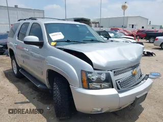 2013 Chevrolet Tahoe LT with VIN 1GNSKBE02DR110158, listed as a IAAI auction lot 36846228 with 125,426 mi miles and . Bid and sale history available at DreamBid. Image 1.