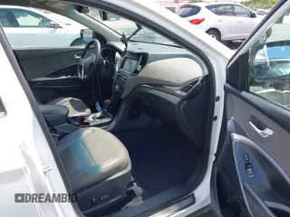 2017 Hyundai Santa Fe 2.4L z VIN 5NMZU3LB9HH034850, wystawiony jako IAAI lot #42342054 z przebiegiem 192 154 mil mil oraz . Historia ofert i sprzedaży dostępna na DreamBid. Obrazek 5.