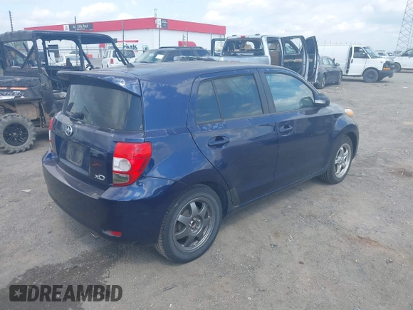 2008 Scion xD with VIN JTKKU10448J004492, listed as a IAAI auction lot 42071070 with 198,787 mi miles. Bid and sale history available at carsss.com. Image 4.