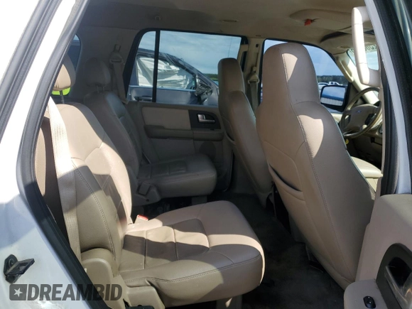 2004 Ford Expedition Special Service with VIN 1FMEU15W04LA49387, listed as a Copart auction lot 52386065 with 322,325 mi miles and Salvage title. Bid and sale history available at DreamBid. Image 11.
