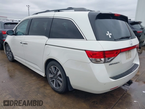 2016 Honda Odyssey Touring Elite with VIN 5FNRL5H9XGB100116, listed as a IAAI auction lot 41543464 with 160,763 mi miles and . Bid and sale history available at DreamBid. Image 3.