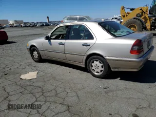 2000 Mercedes-Benz C 230 Kompressor with VIN WDBHA24G5YA826317, listed as a Copart auction lot 69146854 with 103,928 mi miles and Salvage Title. Bid and sale history available at carsss.com. Image 2.