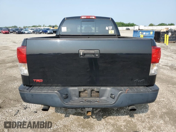 2012 Toyota Tundra with VIN 5TFUW5F10CX213930, listed as a Copart auction lot 60213445 with 147,371 mi miles and Salvage title. Bid and sale history available at DreamBid. Image 6.