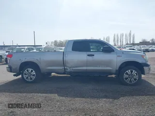 2012 Toyota Tundra 4WD Truck SR with VIN 5TFCW5F19CX012832, listed as a IAAI auction lot 41726453 with 232,078 mi miles. Bid and sale history available at carsss.com. Image 13.