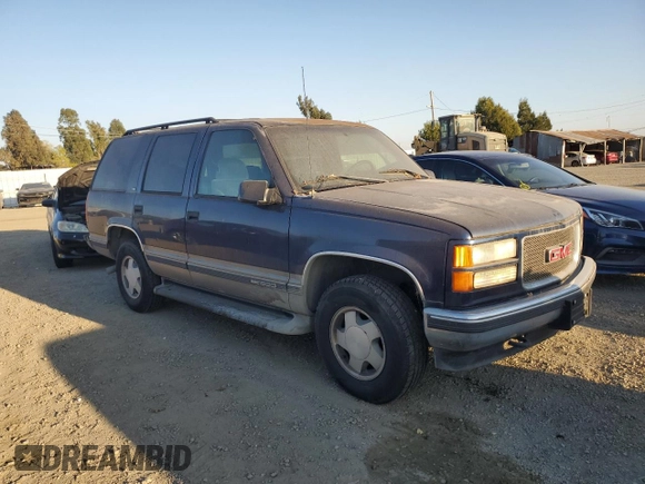 1999 GMC Yukon with VIN 1GKEK13RXXJ748733, listed as a Copart auction lot 74125914 with 172,766 mi miles and Clean Title. Bid and sale history available at carsss.com. Image 4.