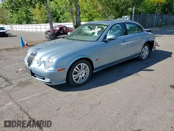 2003 Jaguar S-Type z VIN SAJEA01U53HM73131, wystawiony jako Copart lot #73430914 z przebiegiem 72 730 mil mil oraz Szkody całkowita. Historia ofert i sprzedaży dostępna na DreamBid. Obrazek 11.