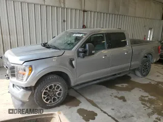 2021 Ford F-150 XL with VIN 1FTFW1E85MKE03933, listed as a Copart auction lot 60513185 with 82,793 mi miles and Salvage title. Bid and sale history available at DreamBid. Image 1.
