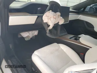 2022 Tesla Model S z VIN 5YJSA1E57NF474679, wystawiony jako Copart lot #56608285 z przebiegiem Nie podano mil oraz Szkoda całkowita • Salvage title. Historia ofert i sprzedaży dostępna na DreamBid. Obrazek 8.