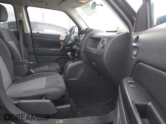 2013 Jeep Patriot Latitude with VIN 1C4NJPFB9DD137649, listed as a IAAI auction lot 42026647 with 130,307 mi miles and . Bid and sale history available at carsss.com. Image 5.