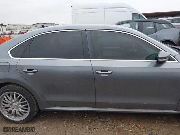 2013 Volkswagen Passat SE w/Sunroof with VIN 1VWBH7A30DC023976, listed as a IAAI auction lot 41392821 with 134,736 mi miles. Bid and sale history available at carsss.com. Image 14.
