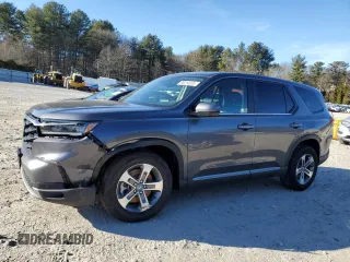2025 Honda Pilot EX-L with VIN 5FNYG1H44SB012586, listed as a Copart auction lot 88014035 with 8,596 mi miles and Salvage Title. Bid and sale history available at carsss.com. Image 1.