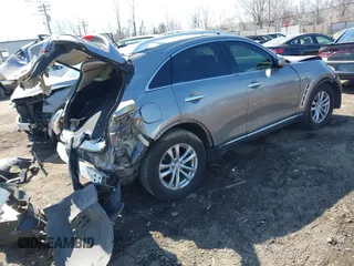 2011 Infiniti FX with VIN JN8AS1MW1BM733922, listed as a IAAI auction lot 41779209 with 174,575 mi miles. Bid and sale history available at carsss.com. Image 4.