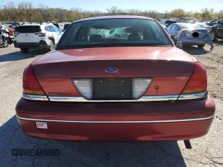 1998 Ford Crown Victoria LX с VIN 2FAFP74W4WX118422, выставлен на аукционе Copart как лот 78716184 с пробегом 70 214 миль миль и Списание • Salvage title. История ставок и продаж доступна на DreamBid. Изображение 6.