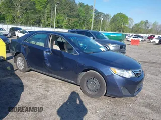 2014 Toyota Camry L with VIN 4T1BF1FK3EU820882, listed as a IAAI auction lot 42012278 with 174,000 mi miles and . Bid and sale history available at DreamBid. Image 1.