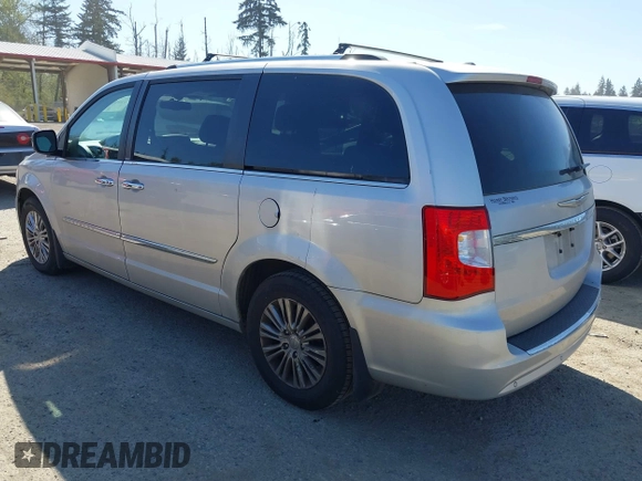 2011 Chrysler Town & Country Limited with VIN 2A4RR6DG4BR667311, listed as a IAAI auction lot 42057487 with 93,628 mi miles. Bid and sale history available at carsss.com. Image 3.