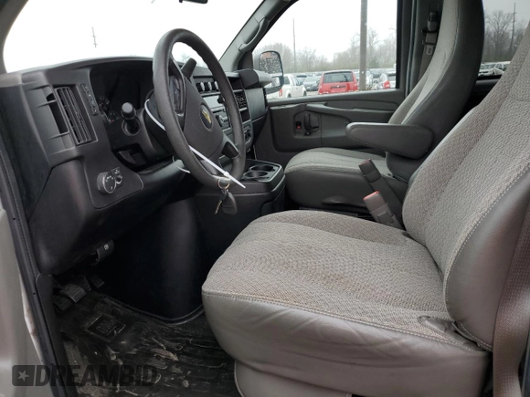 2013 Chevrolet Express Passenger 1LT с VIN 1GAZGYFG4D1190237, выставлен на аукционе Copart как лот 49204764 с пробегом 159 160 миль миль и Списание • Salvage title. История ставок и продаж доступна на DreamBid. Изображение 7.
