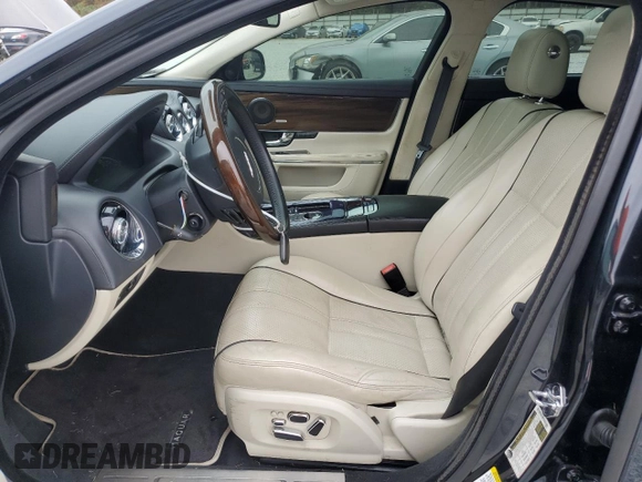 2012 Jaguar XJ Supercharged with VIN SAJWA2GE3CMV28747, listed as a Copart auction lot 77836394 with 139,731 mi miles and Clean title. Bid and sale history available at DreamBid. Image 7.