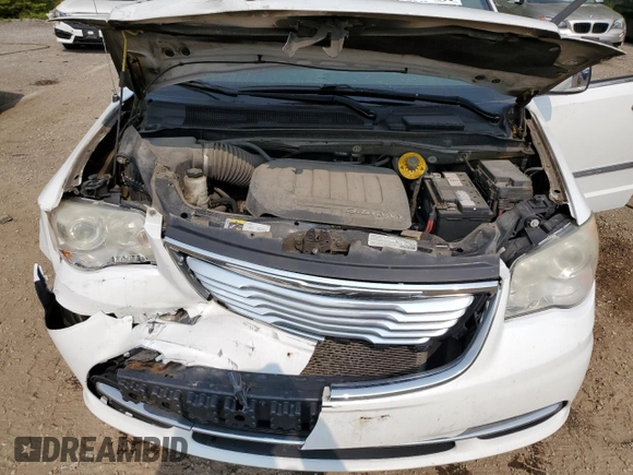 2014 Chrysler Town & Country Limited z VIN 2C4RC1GG3ER151709, wystawiony jako Copart lot #58435695 z przebiegiem 244 241 mil mil oraz Szkoda całkowita • Salvage title. Historia ofert i sprzedaży dostępna na DreamBid. Obrazek 12.