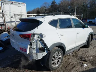 2016 Hyundai Tucson SE with VIN KM8J3CA45GU245793, listed as a IAAI auction lot 41601244 with 116,701 mi miles. Bid and sale history available at carsss.com. Image 4.