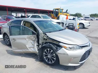 2018 Toyota Avalon Hybrid XLE Plus z VIN 4T1BD1EB5JU060570, wystawiony jako IAAI lot #42270625 z przebiegiem 100 010 mil mil oraz . Historia ofert i sprzedaży dostępna na DreamBid. Obrazek 6.