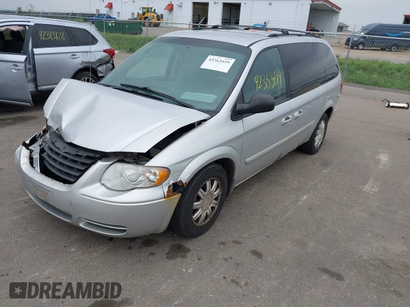 2006 Chrysler Town & Country Touring z VIN 2A4GP54L96R730719, wystawiony jako IAAI lot #42363419 z przebiegiem 186 173 mil mil oraz . Historia ofert i sprzedaży dostępna na DreamBid. Obrazek 2.