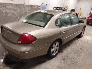 2003 Ford Taurus SES Standard with VIN 1FAFP552X3G184894, listed as a IAAI auction lot 41846677 with 160,824 mi miles. Bid and sale history available at carsss.com. Image 4.