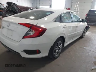 2017 Honda Civic LX with VIN 19XFC2F5XHE007668, listed as a IAAI auction lot 42219927 with 132,444 mi miles and . Bid and sale history available at DreamBid. Image 4.