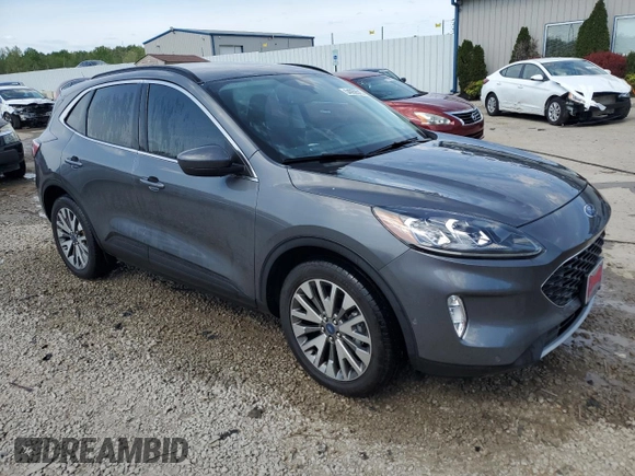 2021 Ford Escape Titanium Hybrid z VIN 1FMCU9DZ4MUA56645, wystawiony jako Copart lot #54059515 z przebiegiem 31 432 mil mil oraz Szkoda całkowita • Salvage title. Historia ofert i sprzedaży dostępna na DreamBid. Obrazek 4.