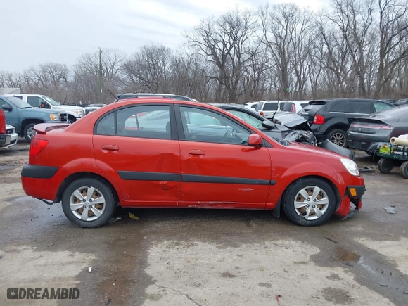 2009 Kia Rio SX with VIN KNADE223796561406, listed as a IAAI auction lot 41650749 with 100,041 mi miles. Bid and sale history available at carsss.com. Image 13.