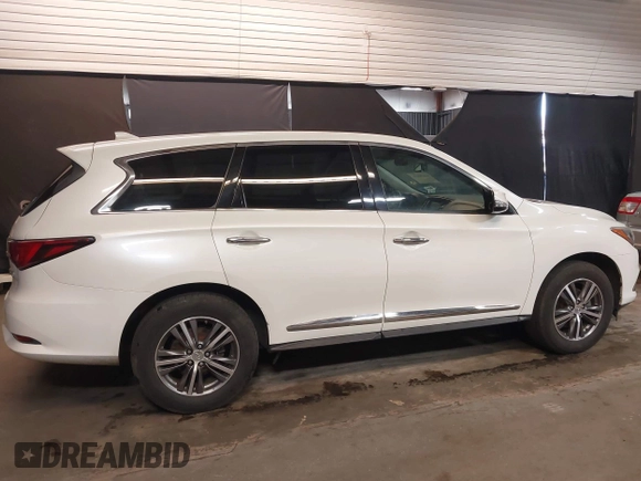 2016 Infiniti QX60 with VIN 5N1AL0MM0GC511950, listed as a IAAI auction lot 41690626 with 102,198 mi miles and . Bid and sale history available at DreamBid. Image 14.
