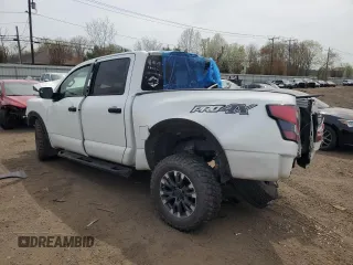 2021 Nissan Titan Pro-4X с VIN 1N6AA1ED9MN522375, выставлен на аукционе Copart как лот 54045655 с пробегом Не указан миль и Списание • Salvage title. История ставок и продаж доступна на DreamBid. Изображение 2.