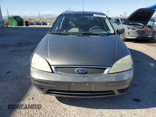 2007 Ford Focus S z VIN 1FAHP34N77W192231, wystawiony jako Copart lot #59020505 z przebiegiem 99 284 mil mil oraz Szkoda całkowita • Salvage title. Historia ofert i sprzedaży dostępna na DreamBid. Obrazek 5.