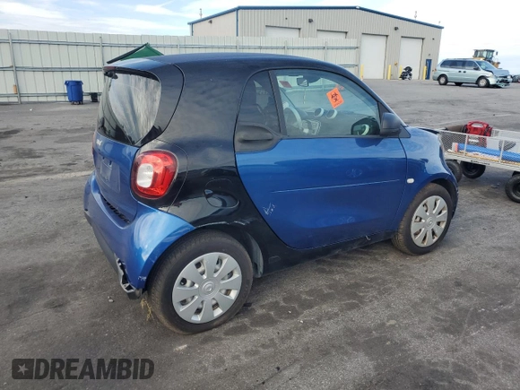 2016 Smart fortwo Passion z VIN WMEFJ5DA0GK076339, wystawiony jako Copart lot #68891564 z przebiegiem Nie podano mil oraz Szkoda całkowita • Salvage title. Historia ofert i sprzedaży dostępna na DreamBid. Obrazek 3.